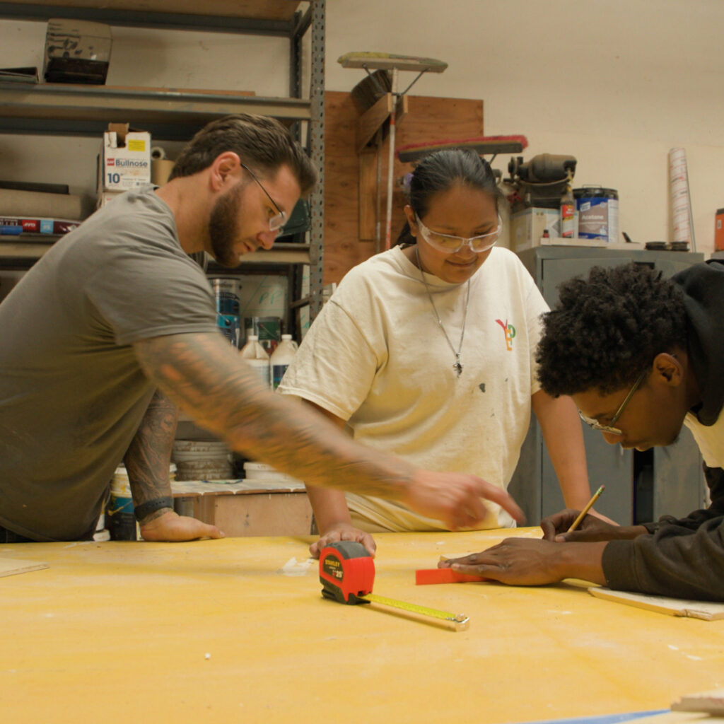 Mentor training two students
